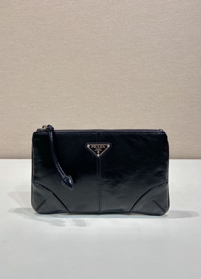 Pra*a clutch bags